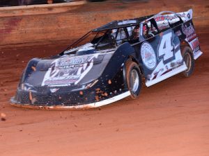 Danny Sanders kicks the dirt up as he powers around Hartwell Speedway.  Sanders drove to the SECA Crate Late Model feature win at Hartwell on Saturday night.  Photo by Heather Rhoades