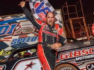 David Payne celebrates after climbing from his car in victory lane after winning Saturday night's Super Late Model feature at Dixie Speedway. Photo by Kevin Prater/praterphoto.com