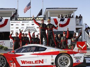 Eric Curran and Dane Cameron celebrate with their Action Express Racing team after scoring the Prototype class victory in Sunday's IMSA WeatherTech SportsCar Championship race at Road America.  Photo: Michael L. Levitt LAT Photo USA
