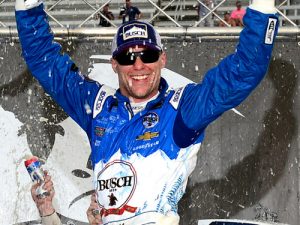 Kevin Harvick celebrates in victory lane after winning Sunday's NASCAR Sprint Cup Series race at Bristol Motor Speedway. The race was delayed due to inclement weather on Saturday. Photo by Jeff Curry/NASCAR via Getty Images
