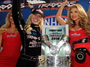 Courtney Force celebrates after winning Saturday's Funny Car portion of the NHRA Traxxas Nitro Shootout at Lucas Oil Raceway Park.  Photo: NHRA Media