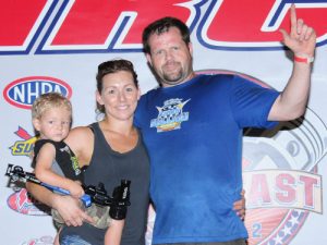 Don Brown, Jr. celebrates with his family after winning in Saturday's Super Pro final as part of the Summit ET Series at Atlanta Dragway. Photo by Jerry Towns