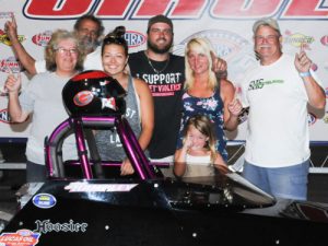 Hank Wilhelm celebrates with his family after scoring the win in the first of two Super Pro finals held during a double-feature Summit ET drag race event at Atlanta Dragway. Photo by Jerry Towns