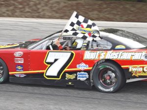 Travis Benjamin takes a victory lap after winning Saturday's PASS North Super Late Model race at Beech Ridge Motor Speedway.  Photo by Norm Marx
