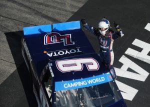 William Byron salutes the crowd after winning Saturday's NASCAR Camping World Truck Series race at New Hampshire Motor Speedway.  Photo by Rainier Ehrhardt/NASCAR via Getty Images