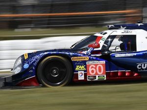 The No. 60 Honda driven by the team of Olivier Pla, John Pew and Oswaldo Negri, Jr. powered to the victory in Saturday's Petit Le Mans at Road Atlanta.  Photo by Richard Dole LAT Photo USA