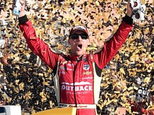 Kevin Harvick celebrates in victory lane after winning Sunday's NASCAR Sprint Cup Series race at Kansas Speedway.  Photo by Jason Hanna/Getty Images