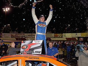 Ryan Partridge celebrated in victory lane following his third win of the season at All American Speedway Saturday night. Photo by Jonathan Moore/NASCAR via Getty Images