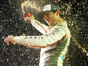 Daniel Suarez celebrates in victory lane after winning the NASCAR Xfinity Series race and the series Championship Saturday night at Homestead-Miami Speedway.  Photo by  Jonathan Ferrey/NASCAR via Getty Images