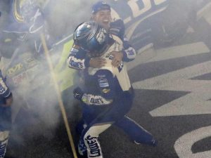 Jimmie Johnson celebrates with his crew after winning Sunday night's NASCAR Sprint Cup Series race and the 2016 series championship at Homestead-Miami Speedway. Photo by Sean Gardner/NASCAR via Getty Images