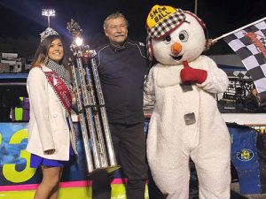 Steve Buttrick was all smiles in victory lane after scoring the Sportsman victory as part of the 49th annual Snowball Derby at 5 Flags Speedway on Thursday night.  Photo: Courtesy 5 Flags Speedway